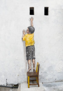 Boy On Chair